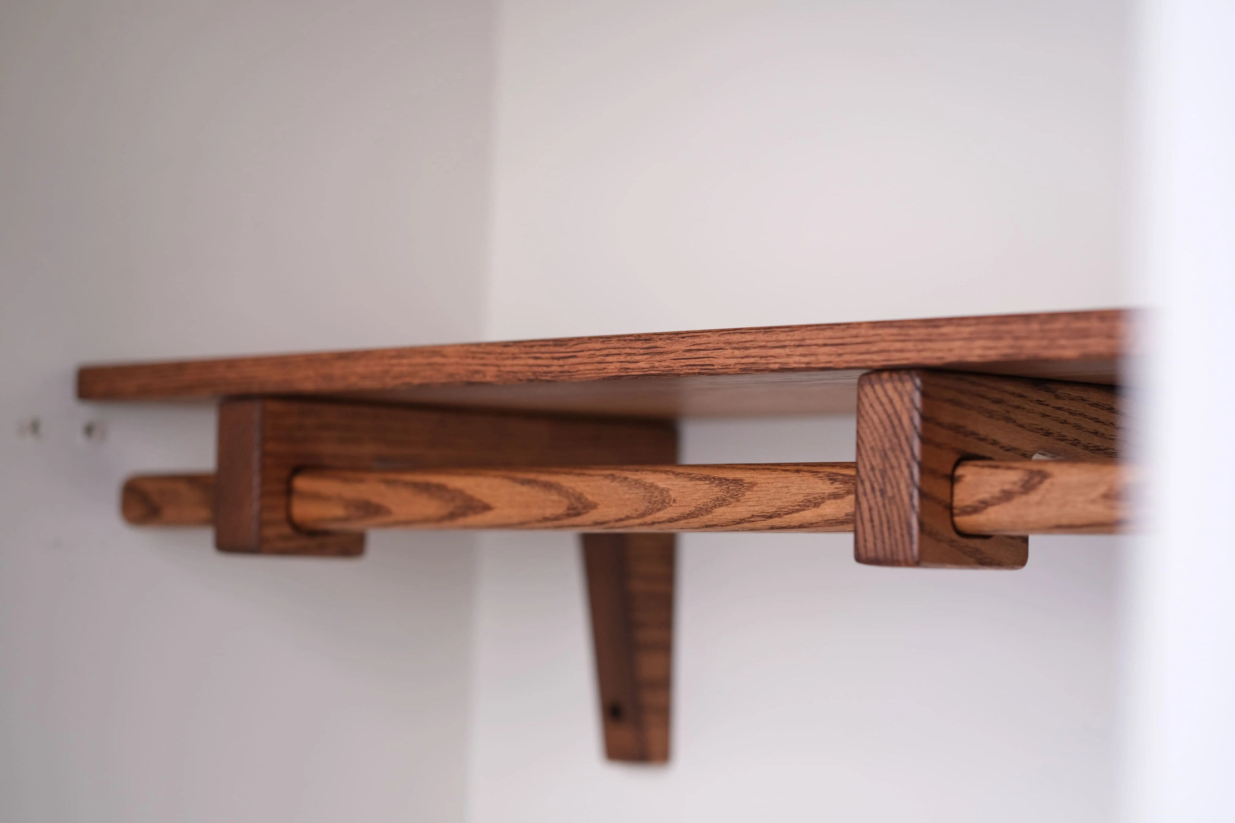 Handmade closet shelf made of brown oak – durable and elegant wardrobe solution