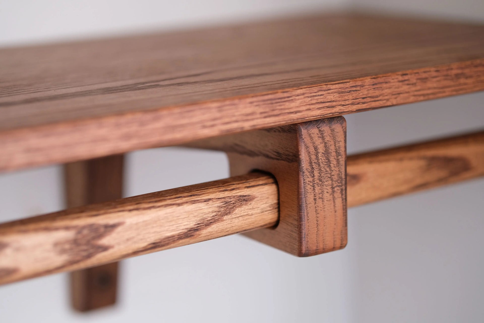 Handcrafted closet shelving system made from solid wood – natural finish with smooth edges