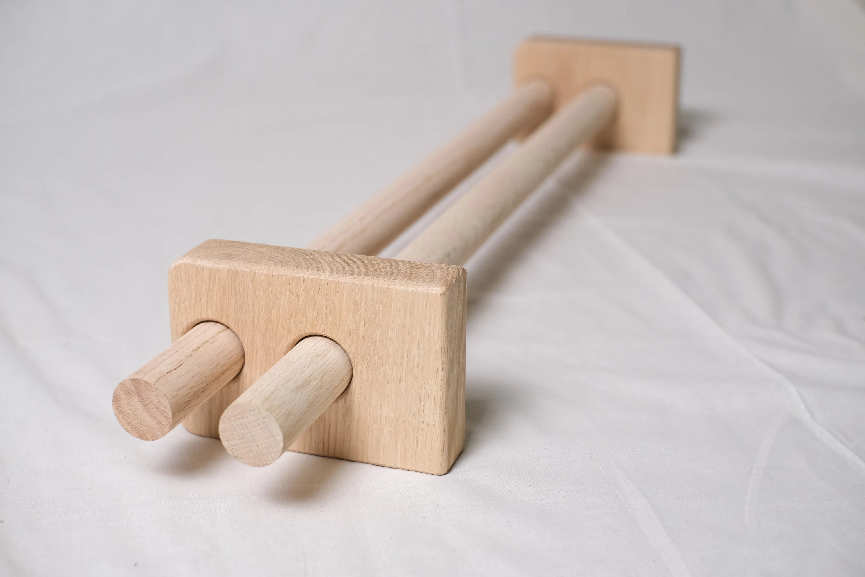 Double curtain rod set with natural wood finish – elegant solution for layered window treatments