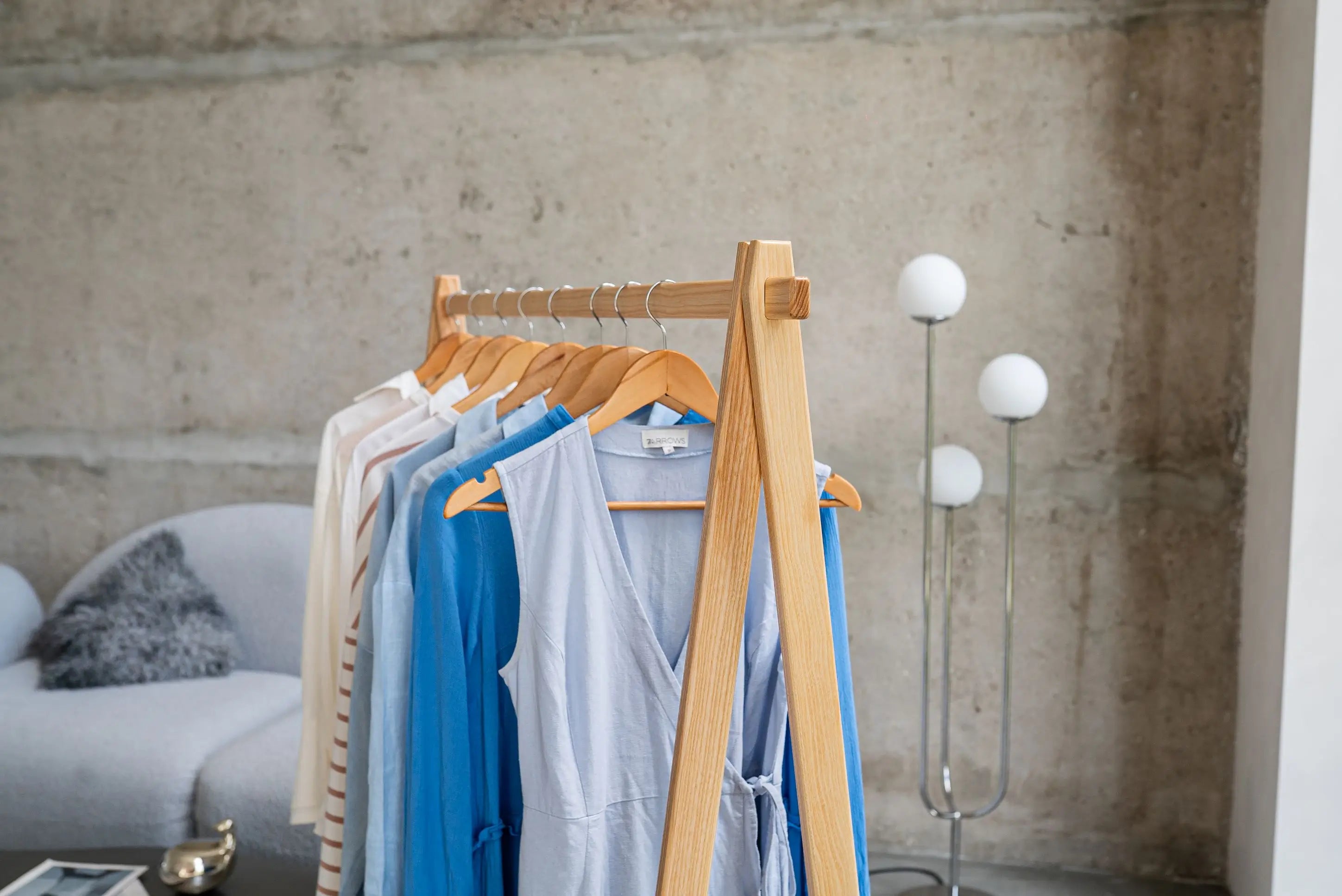 Free-standing boutique rack – handmade wooden display for organized presentation