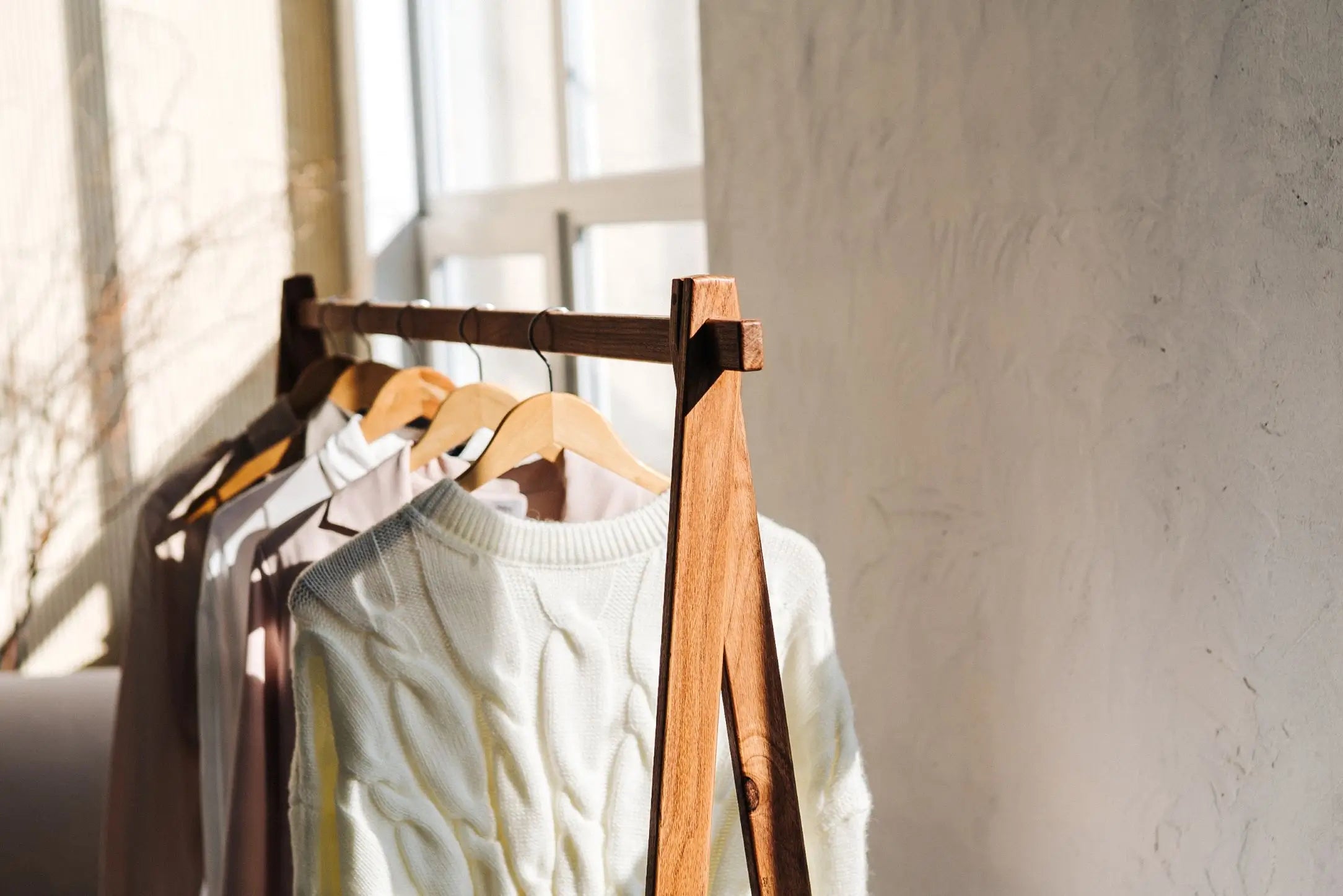 Freestanding retail garment rack with durable build – suits any fashion interior