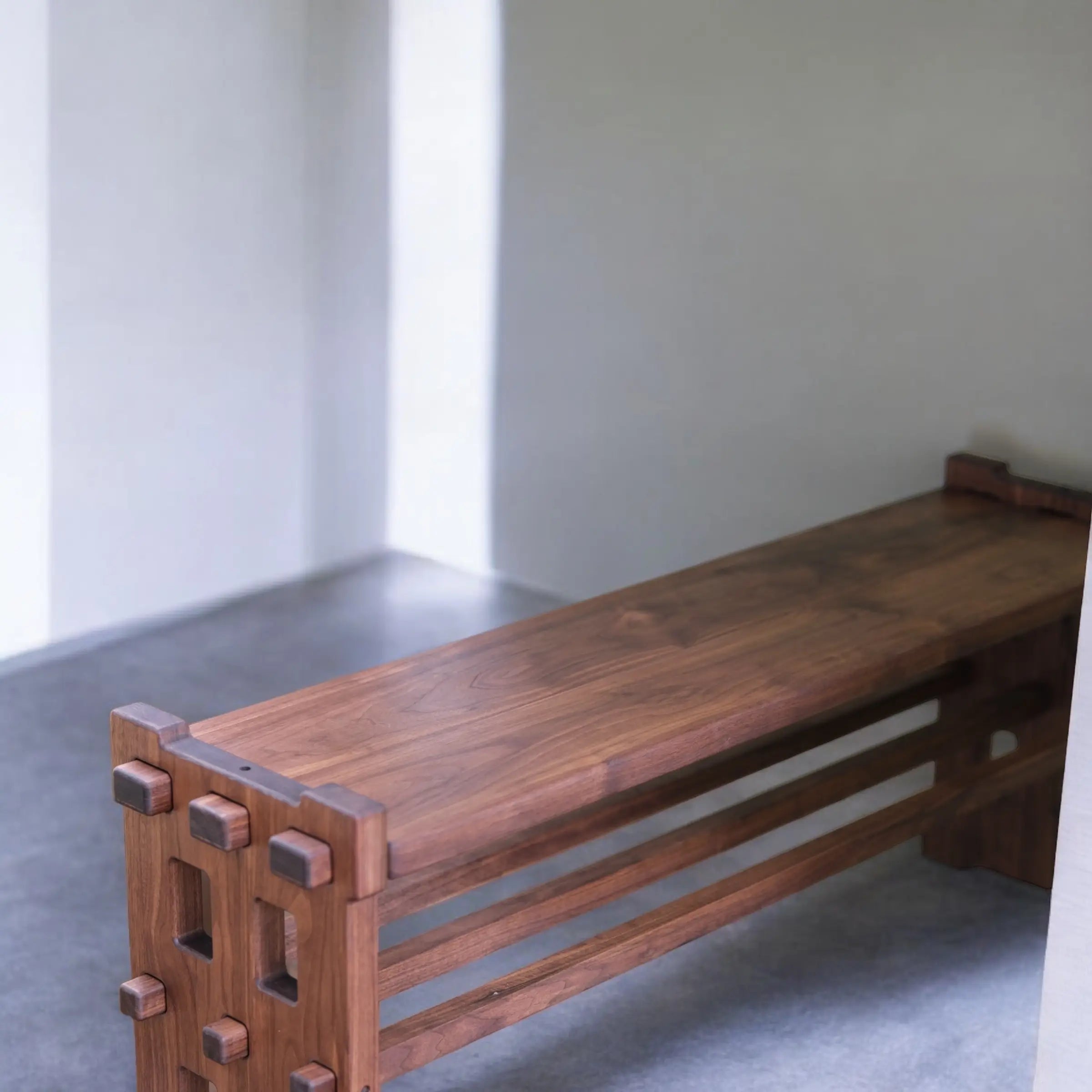 Custom-made walnut bench for hallway seating or bedroom decor