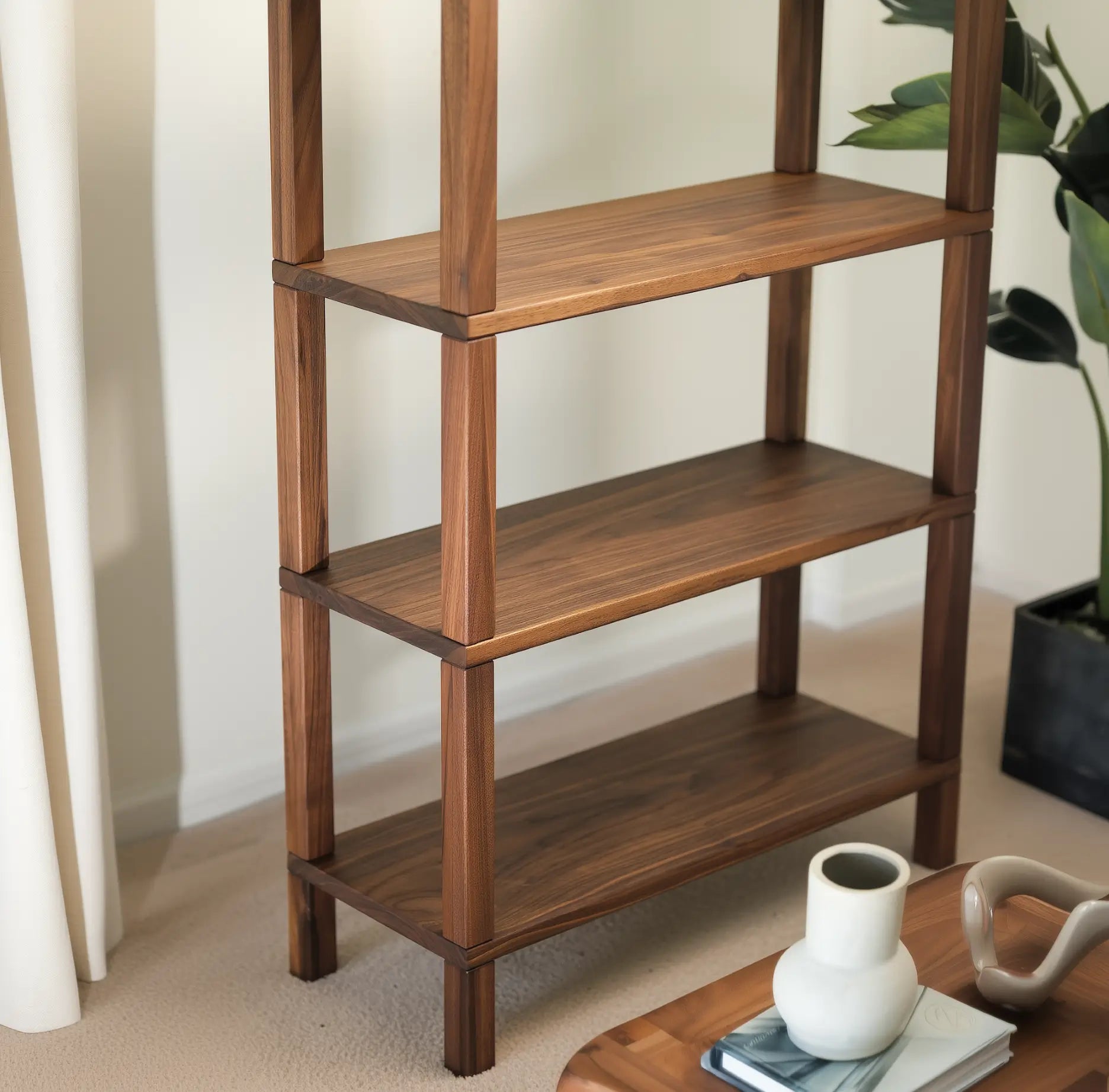Compact walnut bookcase for small spaces

